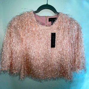 Elegant glitter fringe blush pink cropped top.
